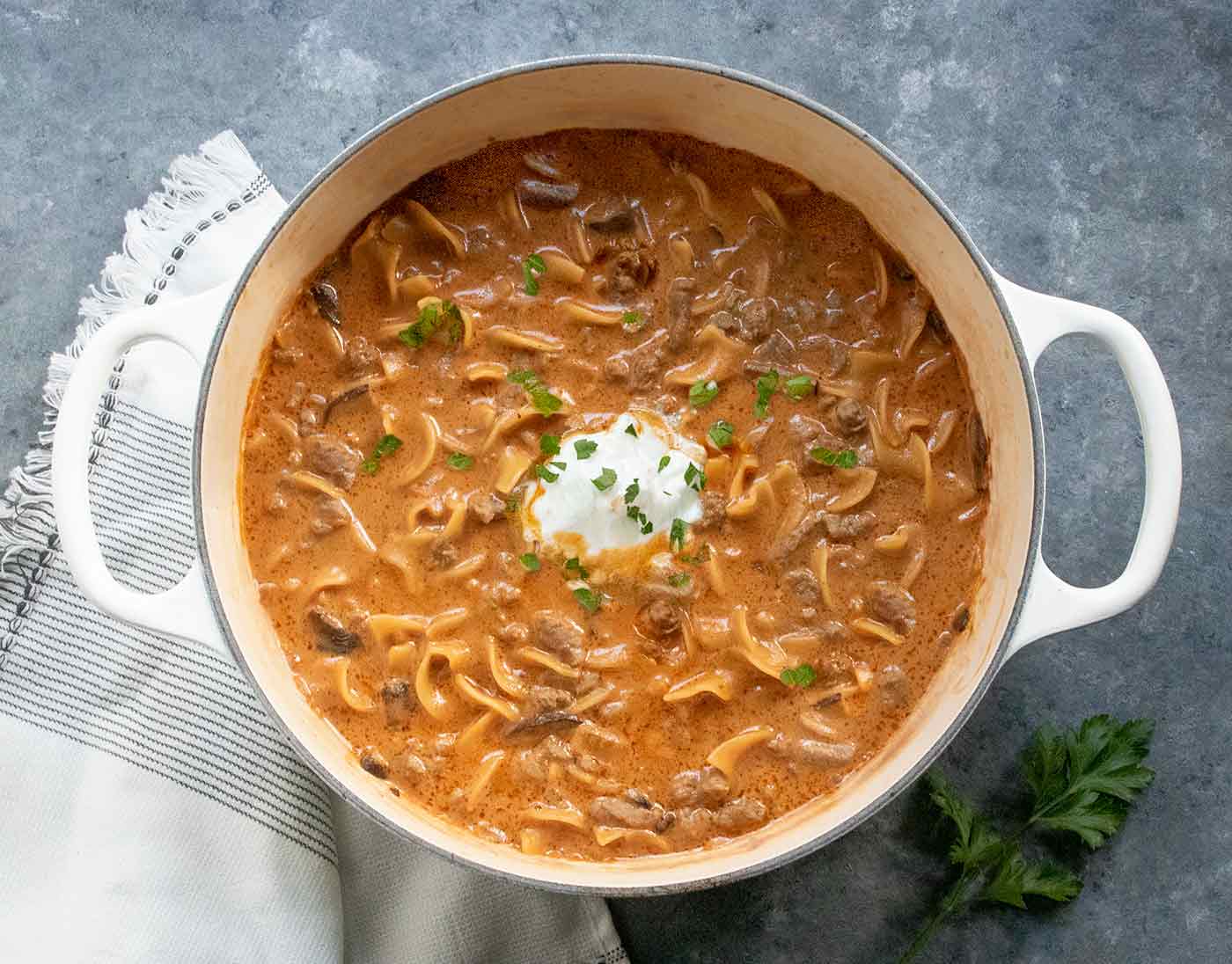 Beef Stroganoff Soup in a white Dutch oven.