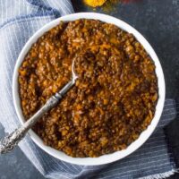 Curried Lentil Stew - with just seven ingredients you probably already have in your pantry, the best and easiest lentil stew is just 30 minutes away. Make-ahead awesome, simple, and satisfying. Recipe at SoupAddict.com