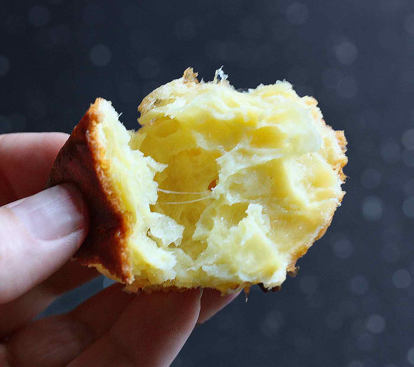 Interior view of a puffy, airy Gougere.